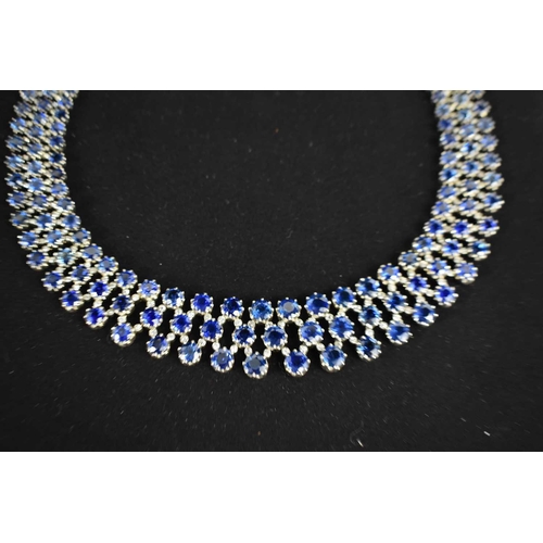 187 - A stunning 18ct white gold, sapphire, and diamond résille collar necklace by Pragnell, showcasing 89... 