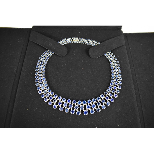 187 - A stunning 18ct white gold, sapphire, and diamond résille collar necklace by Pragnell, showcasing 89... 