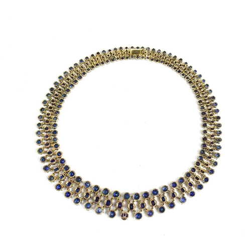 187 - A stunning 18ct white gold, sapphire, and diamond résille collar necklace by Pragnell, showcasing 89... 