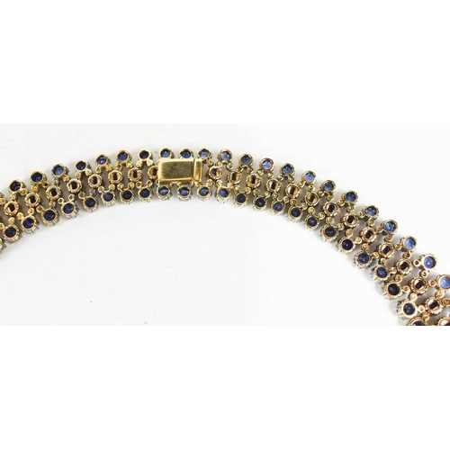 187 - A stunning 18ct white gold, sapphire, and diamond résille collar necklace by Pragnell, showcasing 89... 