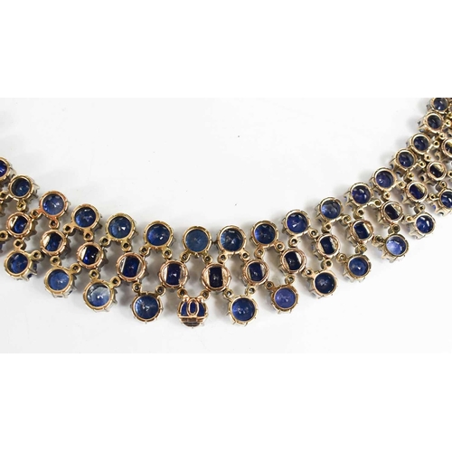 187 - A stunning 18ct white gold, sapphire, and diamond résille collar necklace by Pragnell, showcasing 89... 