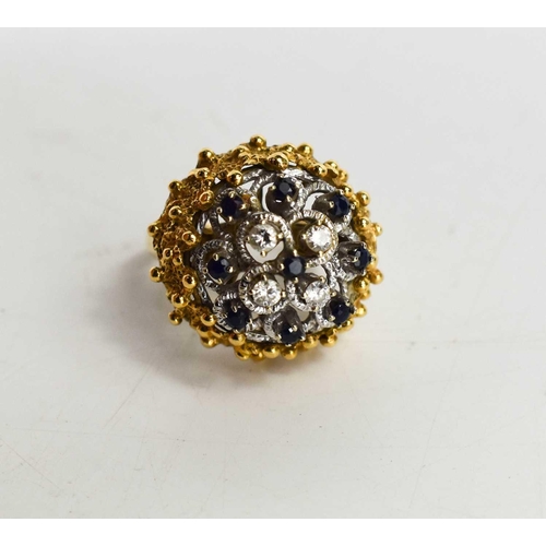 20 - A gold, diamond and sapphire cluster ring, unmarked but testing as 18ct gold, the four brilliant cut... 