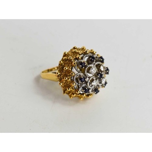 20 - A gold, diamond and sapphire cluster ring, unmarked but testing as 18ct gold, the four brilliant cut... 