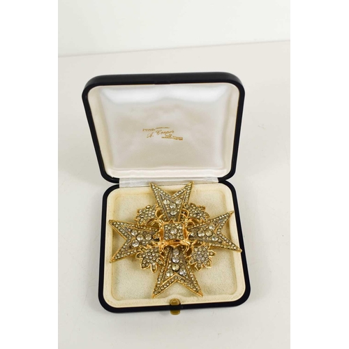 206 - A Maltese Cross brooch by Kenneth J Lane, USA set with paste stones, 8cm wide.