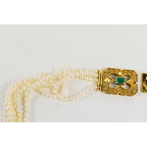 21 - A five strand seed pearl choker with 18ct gold and emerald set clasp in the Byzantine style and four... 