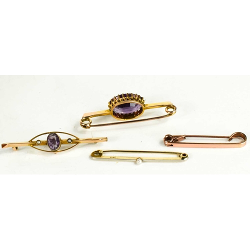 247 - A gold plated and amethyst brooch, the oval cut amethyst 17 by 12mm, 5.74g in total, together with a... 