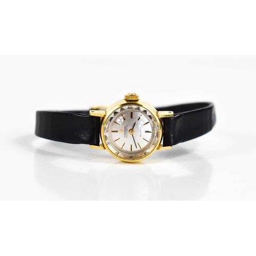 256 - A lady's vintage Omega DeVille cocktail watch, the signed textured dial with gold batons, with signe... 