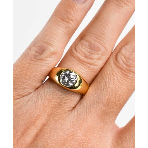 26 - An 18ct gold and diamond solitare ring, the diamond approximately 1 1/4ct, in a rub over setting, si... 