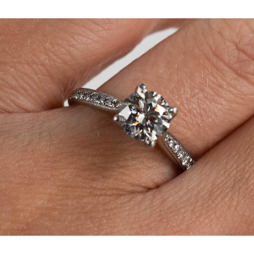 27 - A solitaire diamond and 950 platinum ring, the brilliant cut solitaire of approximately just over 1c... 