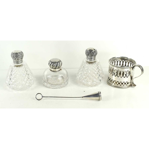 277 - An antique silver plate chamberstick and snufferm the hold with pierced decoration together with two... 