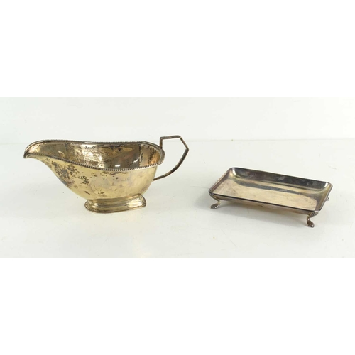 292 - A silver sauce boat, gadrooned border, hallmarked for S. Blanckensee & Son Ltd, Birmingham, together... 