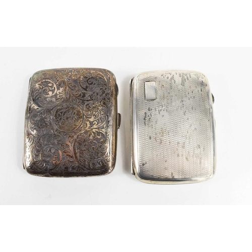 305 - Two silver cigarette cases of curved form, one with scrolling foliate engraving and with monogram to... 