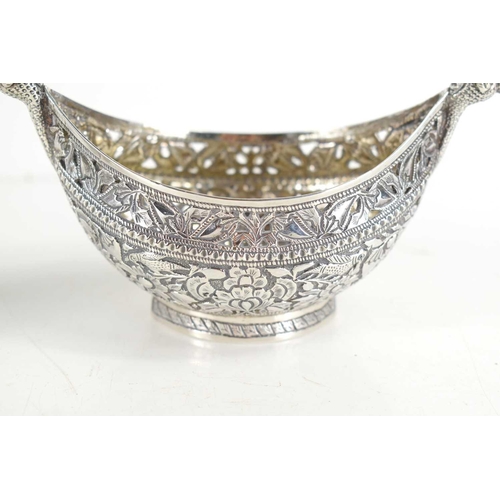 314 - A pair of unusual 19th century Indian white metal (likely silver) boat shaped Bon Bon dishes, ellipt... 