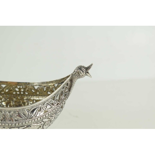 314 - A pair of unusual 19th century Indian white metal (likely silver) boat shaped Bon Bon dishes, ellipt... 