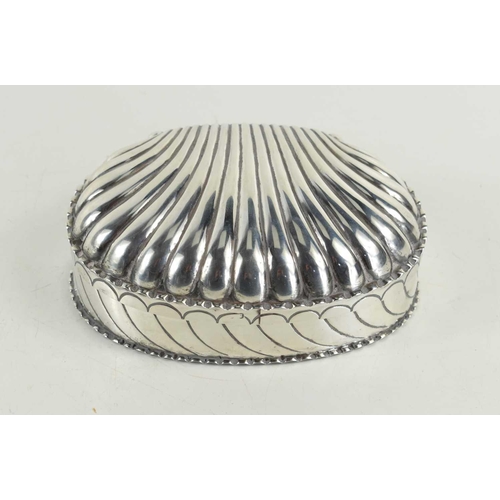 316 - A Victorian silver trinket / jewellery box of scallop shell form, with silver gilt interior, hallmar... 