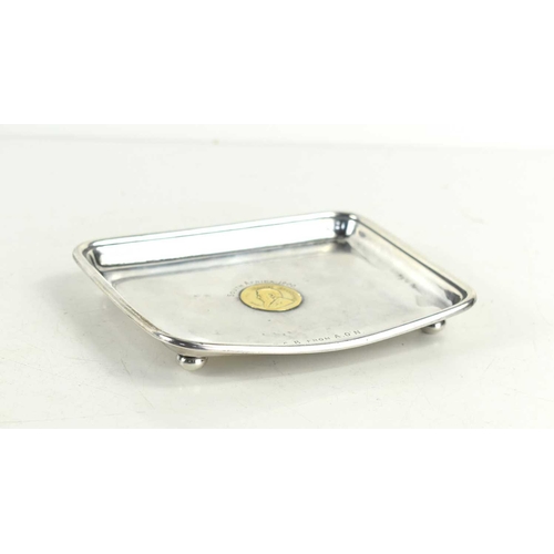 332 - A small silver tray set with a gold South African 1 Pond coin dated 1894, the top of the tray engrav... 