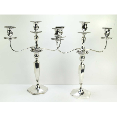 336 - Amended description ** A pair of Edwardian silver candlesticks with a silver plated candelabra top s... 