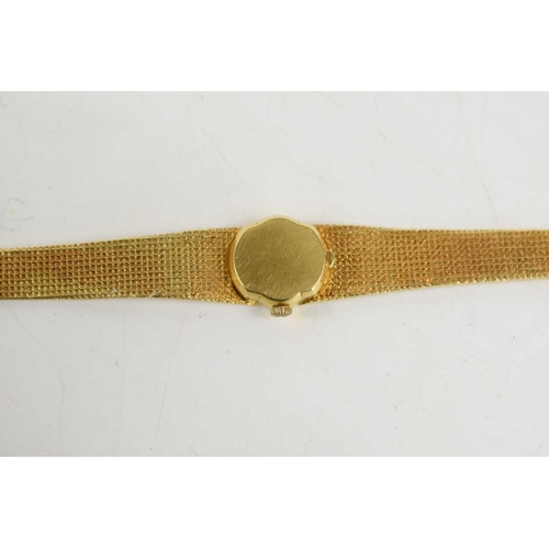 369 - An 18ct gold Omega ladies wristwatch, with matt gold oval dial, 40g.