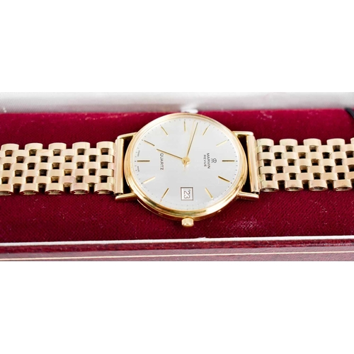 372 - A gentleman's 9ct gold cased Marvin Revue wristwatch, the signed dial with baton markers and date ap... 