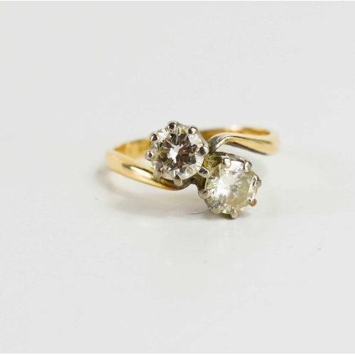 46 - An 18ct gold and platinum diamond 'Toi et Moi' ring, each brilliant cut diamond approximately 1/2 ct... 