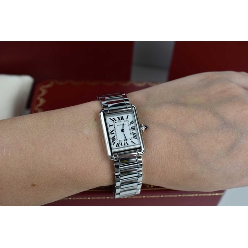 56 - A Cartier Tank Must wristwatch in stainless steel, with a crystal glass front, Roman numeral silvere... 