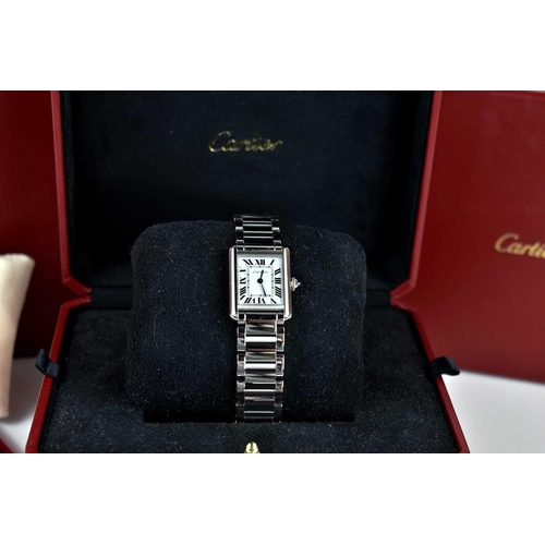 56 - A Cartier Tank Must wristwatch in stainless steel, with a crystal glass front, Roman numeral silvere... 