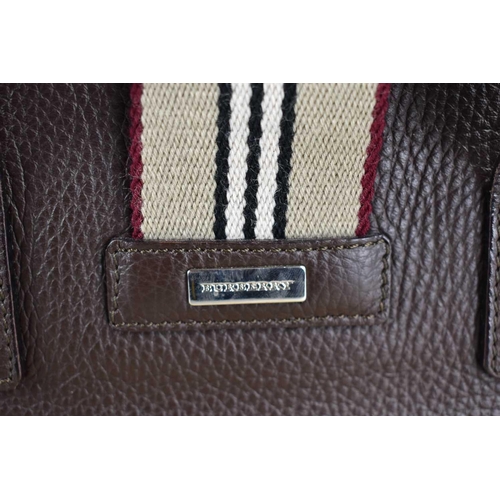 59 - A Burberry dark brown leather tote handbag, with magnetic clasp, and the original dust bag.