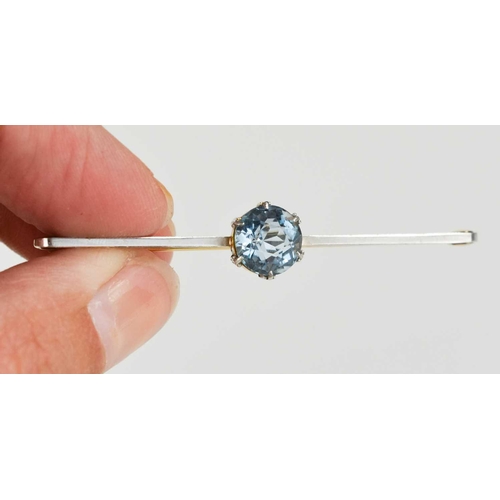 73 - A Victorian 15ct gold and blue topaz bar brooch, circular cut stone of 8.6mm diameter, 3.69g total w... 