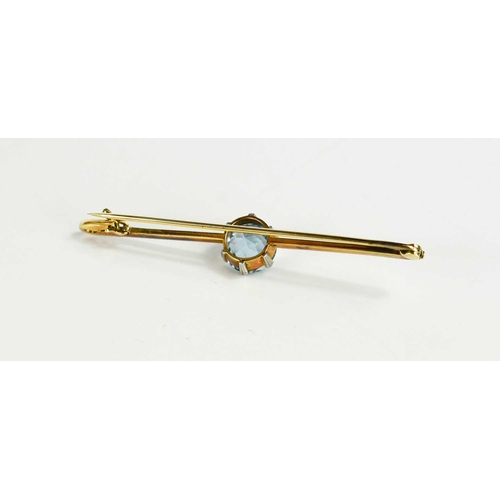 73 - A Victorian 15ct gold and blue topaz bar brooch, circular cut stone of 8.6mm diameter, 3.69g total w... 