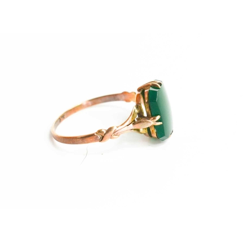 80 - A 9ct gold and jade set ring, size M, 1.3g.