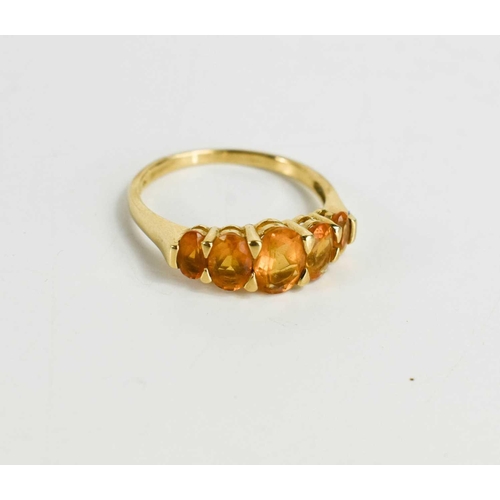 95 - A 9ct gold and citrine five stone ring, the oval cut citirines graduated, size R, 2.5g.