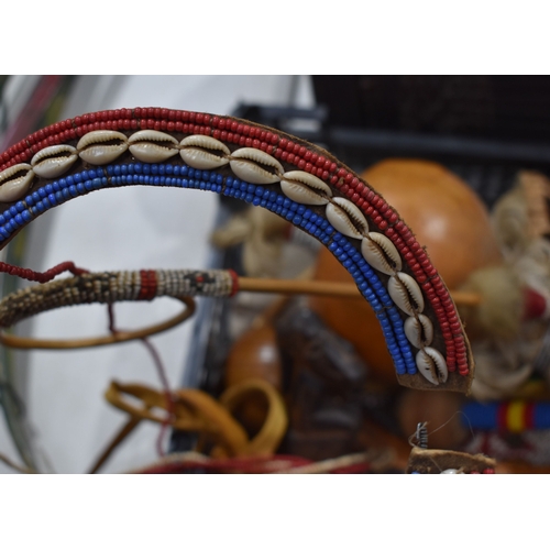 370 - A group of African and Native American items to include a Maasai beaded wedding necklace, a beaded w... 