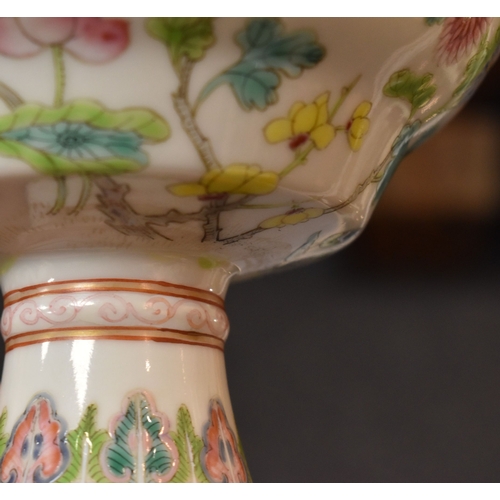 8 - A Chinese Canton Famille Rose pedestal bowl, decorated with chrysanthemums and blossom, above a foli... 