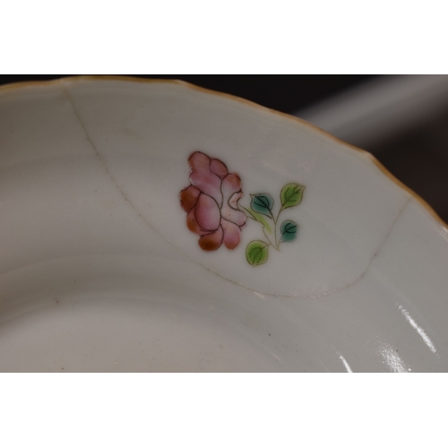 8 - A Chinese Canton Famille Rose pedestal bowl, decorated with chrysanthemums and blossom, above a foli... 