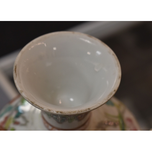 8 - A Chinese Canton Famille Rose pedestal bowl, decorated with chrysanthemums and blossom, above a foli... 