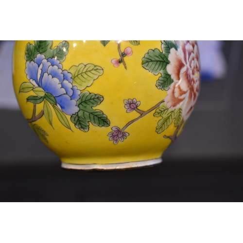 131 - A pair of Chinese cloisonne vases, the yellow ground with birds amongst tree peonies, chrysanthemums... 