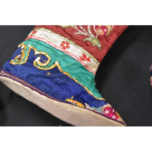 189 - A pair of Chinese boys celebratory boots, hand embroidered, together with three pairs of Chinese 19t... 