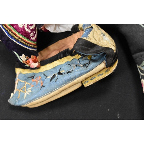 187 - Four pairs of Chinese late 19th / early 20th century Qing Dynasty hand embroidered lotus shoes, of v... 