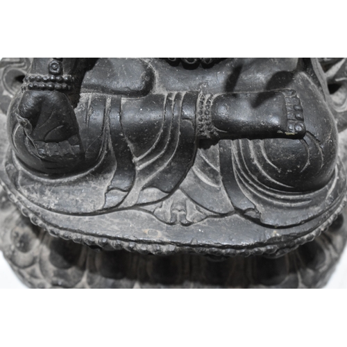 116 - A stone carved Indonesian figure, seated Bodhisattva Avalokiteshvara, the bodhisattva of infinite co... 