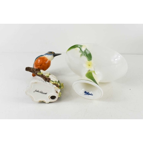 139 - CHARITY LOT: A Beswick porcelain kingfisher perched on a branch adorned with flowers, together with ... 