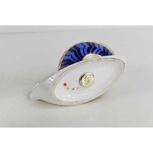 165 - A Royal Crown Derby paperweight in the form of a snail, with silver stopper, 13cm long.