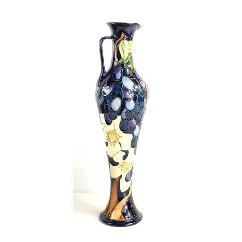 173 - A 2009 Moorcroft Pottery, Mediteranean Collection, Grapes baluster jug, decorated with pomegranates,... 