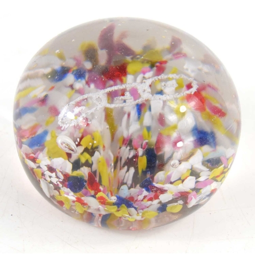 190 - A 19th century glass millefiori paperweight, pontil mark to the base, 7cm high.