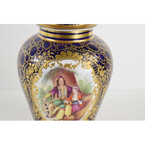 191 - A Sevres quality jar and cover in cobalt blue with gilding, the central hand painted panel depicting... 