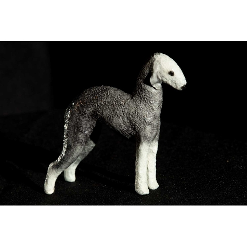 199 - A finely detailed porcelain Bedlington Terrier, synonymous with artist Cragie Aitichson, 12cm tall x... 