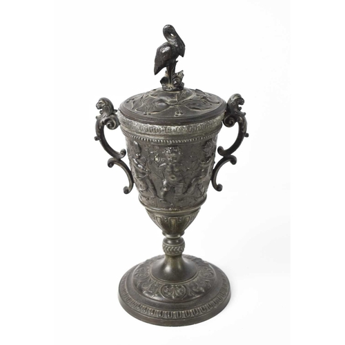 240 - A late 19th / early 20th century bronze Chinese urn and cover, decorated with cherubs, with crane ha... 