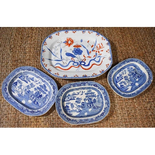 242 - A large blue, white and ironstone red meat platter in the Chinese style, together with three graduat... 