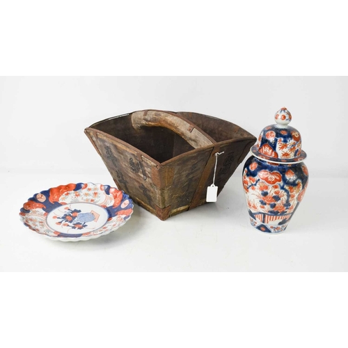 243 - A Chinese rice bucket, having character marks to the side together with a baluster vase and plate, i... 