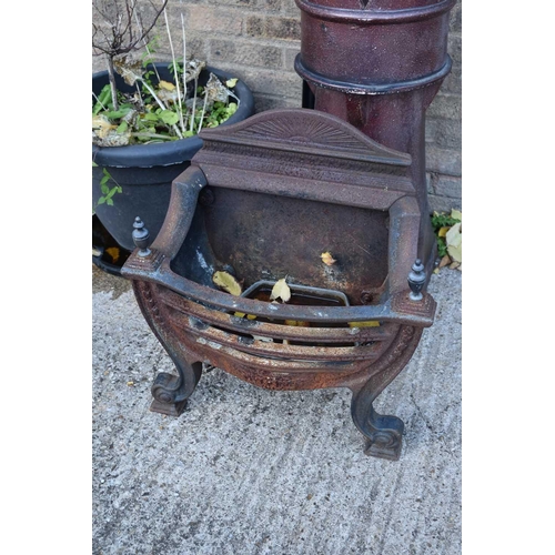 449 - A cast iron fire grate, with bronze urn finials and harebell swag decoration.