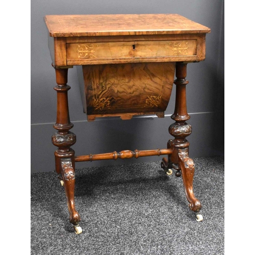 458 - A Victorian walnut marquetry inlaid workbox with slide box drawer, turned columns united by a single... 